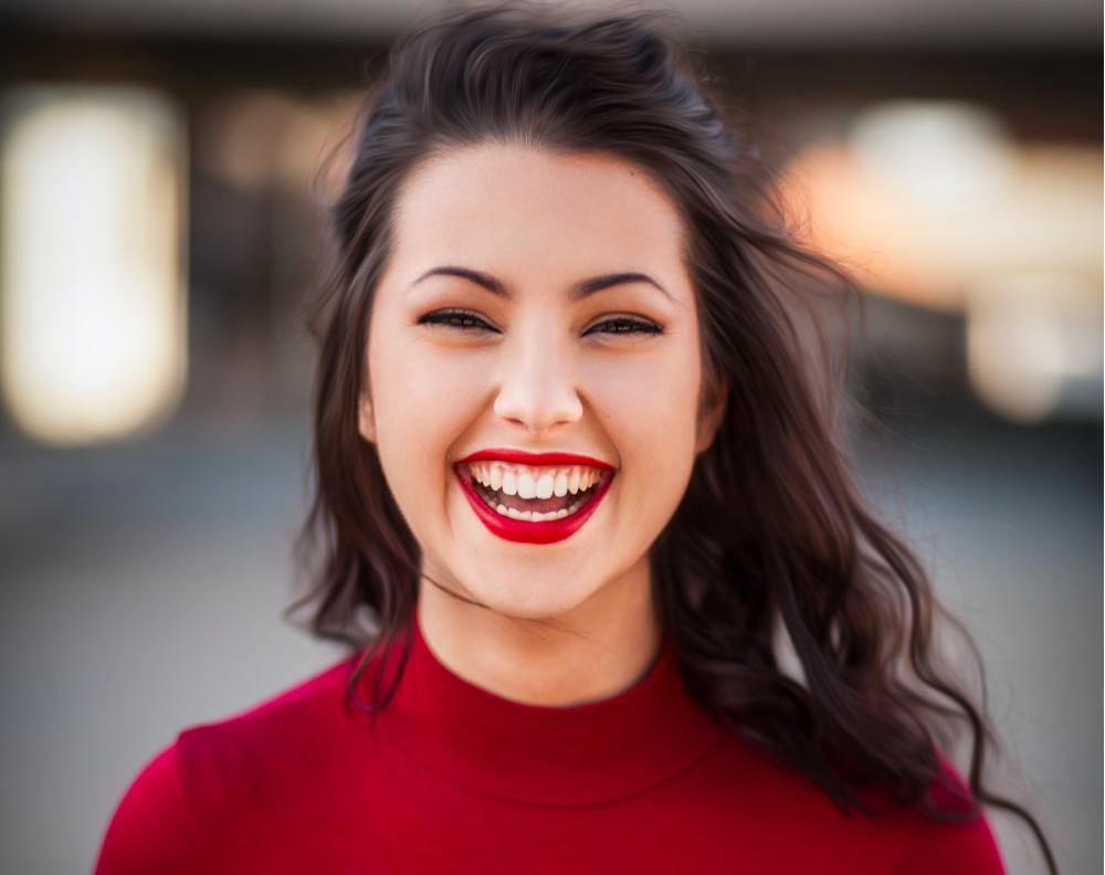 smiling happy woman looking at the camera positive mindset